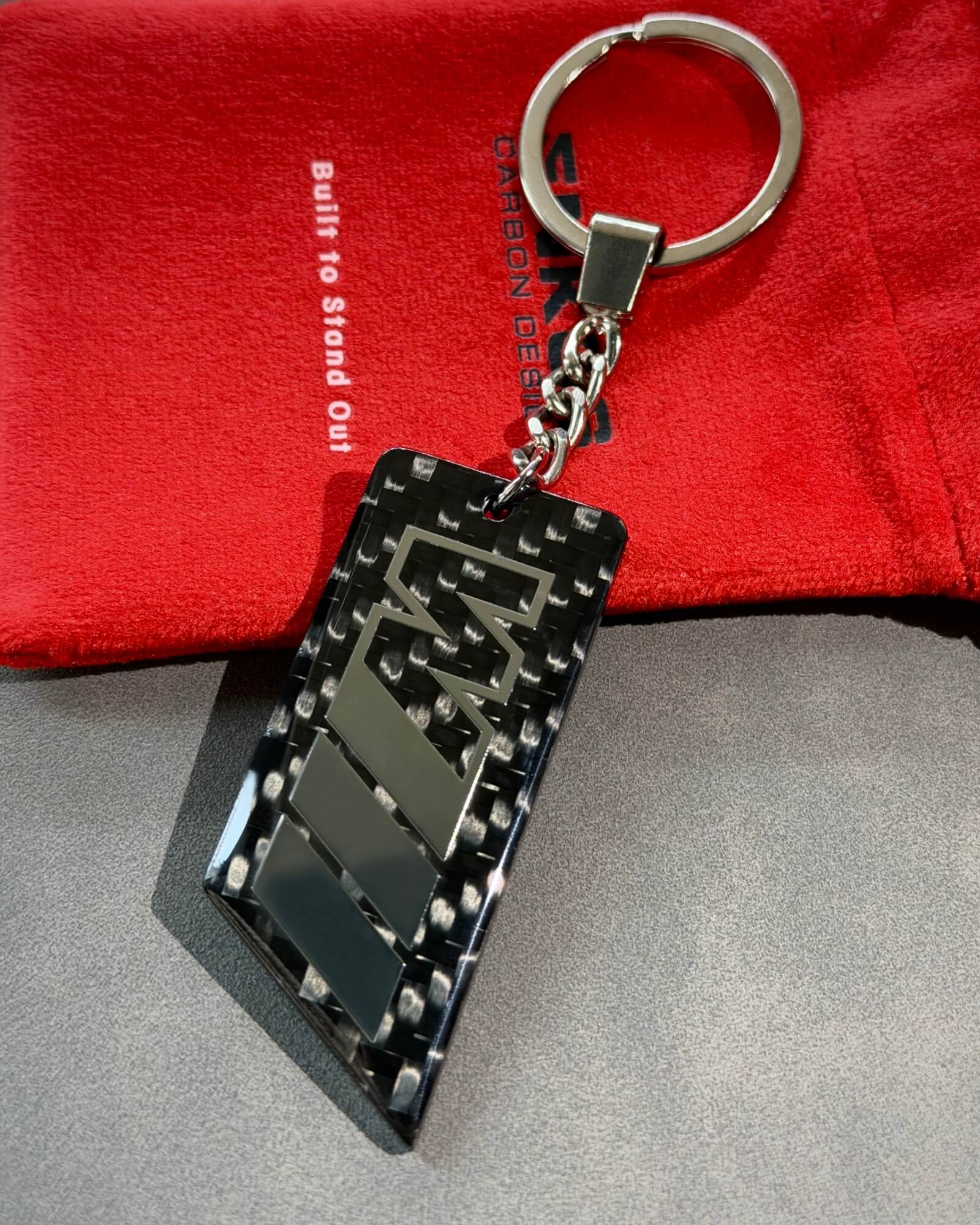 M Series — Carbon Keychain